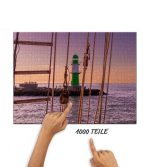 Puzzle Am Molenfeuer der Westmole vorbei – Bild 2